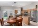 Bright kitchen and dining area with stainless steel appliances and granite countertops at 3017 W Matthew Dr, Phoenix, AZ 85027
