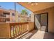 View from balcony of condo with sliding glass doors and string lights at 3031 N Civic Center Plz # 255, Scottsdale, AZ 85251