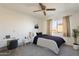 Bedroom featuring a ceiling fan, natural light and a dedicated desk area at 3031 N Civic Center Plz # 255, Scottsdale, AZ 85251