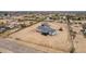 Charming home with a covered porch and detached garage on a spacious, level, and fenced lot at 30433 W Bellview St, Buckeye, AZ 85396