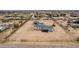 Wide shot with the featured home that has a garage and lots of room for your enjoyment at 30433 W Bellview St, Buckeye, AZ 85396