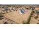 Wide shot with the featured home that has a garage and plenty of room for all of your hobbies at 30433 W Bellview St, Buckeye, AZ 85396