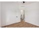 A bright bedroom with wood floors, a ceiling fan, and a closet at 30433 W Bellview St, Buckeye, AZ 85396