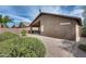 Neutral backyard with block wall, gravel, pavers, and covered patio at 30458 N Sunray Dr, San Tan Valley, AZ 85143