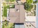 Aerial view of a house showcasing a well-maintained roof, artificial grass, and a landscaped backyard at 3246 E Palm Ln, Phoenix, AZ 85008