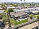 Aerial view of a home with a lush backyard, outdoor seating, and a hammock, perfect for relaxation at 3246 E Palm Ln, Phoenix, AZ 85008