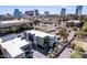 Modern home with solar panels has lush landscaping and city views in a vibrant neighborhood at 340 E Osborn Rd # 3, Phoenix, AZ 85012