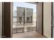 View of the other units from an enclosed balcony with metal railing and concrete floor at 340 E Osborn Rd # 3, Phoenix, AZ 85012