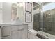 Bathroom featuring a vessel sink, modern vanity, and glass-enclosed shower at 340 E Osborn Rd # 3, Phoenix, AZ 85012