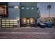 Street view of a modern multi-level home featuring parking, architectural details and clean landscaping at 340 E Osborn Rd # 3, Phoenix, AZ 85012
