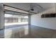 Spacious garage with epoxy flooring, automatic door opener, and storage cabinets at 340 E Osborn Rd # 3, Phoenix, AZ 85012