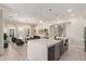 Open-concept kitchen featuring a large island, modern appliances, and seamless flow into the living spaces at 340 E Osborn Rd # 3, Phoenix, AZ 85012