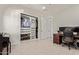 Bright office with a closet, a desk with monitors, and wood-look flooring at 340 E Osborn Rd # 3, Phoenix, AZ 85012
