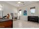Office space with a piano, built-in desk, and large windows at 340 E Osborn Rd # 3, Phoenix, AZ 85012
