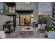 Cozy backyard patio with a fire pit, grill, and outdoor seating for entertaining at 340 E Osborn Rd # 3, Phoenix, AZ 85012