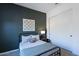 A well-appointed bedroom features a modern color palette and ample space at 3429 E Constance Way, Phoenix, AZ 85042