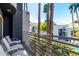 Relax on this balcony with views of palm trees, a sparkling pool, and lush landscaping in a private community at 3633 N 3Rd Ave # 2012, Phoenix, AZ 85013
