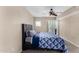 Bedroom with ceiling fan, balcony access, and comfortable carpeting at 3633 N 3Rd Ave # 2012, Phoenix, AZ 85013
