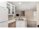 Kitchen view with stainless steel sink, dishwasher, and white cabinets at 3633 N 3Rd Ave # 2012, Phoenix, AZ 85013
