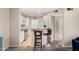 Bright kitchen with white cabinets, a breakfast bar, and modern appliances at 3633 N 3Rd Ave # 2012, Phoenix, AZ 85013