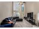 Bright living room featuring high ceilings, large windows, and a comfortable seating area at 3633 N 3Rd Ave # 2012, Phoenix, AZ 85013