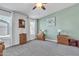 Spacious bedroom featuring soft carpet, neutral tones, and well-lit windows, creating a cozy and inviting atmosphere at 40511 N Birdie St, San Tan Valley, AZ 85140