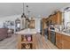Spacious kitchen with large island, stainless appliances, and open layout great for entertaining at 40511 N Birdie St, San Tan Valley, AZ 85140