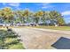 Enjoy a friendly match of shuffleboard on this well-maintained court with lush trees surrounding the area at 40511 N Birdie St, San Tan Valley, AZ 85140