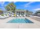 Enjoy a relaxing spa with lounge chairs and tables under the warm sun with plenty of seating around at 40511 N Birdie St, San Tan Valley, AZ 85140