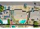 Overhead shot showcasing a home's roof, backyard with a pool, and its position in the neighborhood at 4139 W Anderson Dr, Glendale, AZ 85308
