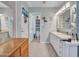 Bathroom boasts double sinks, ample counter space, and en suite toilet and storage at 4139 W Anderson Dr, Glendale, AZ 85308
