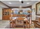 The dining room features a tile floor and a dining table with 6 chairs that leads into the kitchen at 4139 W Anderson Dr, Glendale, AZ 85308