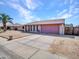 A single-story brick home with a charming exterior featuring a driveway and well-maintained landscaping at 4139 W Anderson Dr, Glendale, AZ 85308