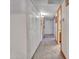 Hallway with neutral tile flooring and closet at 4139 W Anderson Dr, Glendale, AZ 85308