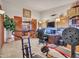Well-equipped home gym with a variety of exercise equipment and natural light, perfect for a healthy lifestyle at 4139 W Anderson Dr, Glendale, AZ 85308