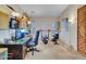 Functional home gym with ample workout equipment, neutral walls, and natural light for a motivating fitness space at 4139 W Anderson Dr, Glendale, AZ 85308