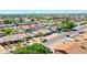 Picture of neighborhood showcasing the home, surrounding houses, and mature landscaping at 4139 W Anderson Dr, Glendale, AZ 85308