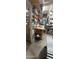 Organized workshop with shelving and a workbench, offering a practical space for projects and hobbies at 4139 W Anderson Dr, Glendale, AZ 85308
