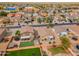 Wide angle of neighborhood with an array of houses with enclosed backyards and an assortment of outdoor living spaces at 4213 E Shapinsay Dr, San Tan Valley, AZ 85140
