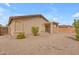 The home features a covered patio and a low maintenance backyard with desert landscaping at 4213 E Shapinsay Dr, San Tan Valley, AZ 85140