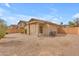 Home with a backyard featuring desert landscaping and a covered patio at 4213 E Shapinsay Dr, San Tan Valley, AZ 85140