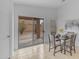 Dining room features sliding glass door to backyard and tile flooring at 4213 E Shapinsay Dr, San Tan Valley, AZ 85140