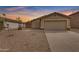 Charming single-story home featuring a neutral color palette, tile roof, and low-maintenance landscaping at 4213 E Shapinsay Dr, San Tan Valley, AZ 85140