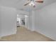 Open concept living room with neutral color palette and carpet flooring at 4213 E Shapinsay Dr, San Tan Valley, AZ 85140