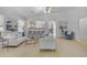 Spacious and bright living room offers a versatile space for relaxing or entertaining at 4213 E Shapinsay Dr, San Tan Valley, AZ 85140