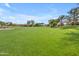 Enjoy the expansive green space and mature landscaping in this community park at 4213 E Shapinsay Dr, San Tan Valley, AZ 85140