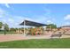 Community playground featuring modern play equipment and shaded area for to enjoy at 4213 E Shapinsay Dr, San Tan Valley, AZ 85140