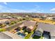 An aerial view showcasing a home with a pool, well-manicured landscaping, and neighborhood at 4247 S Zenith --, Mesa, AZ 85212