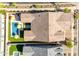 Overhead view of a home with a private pool, turf yard and covered patio area at 4247 S Zenith --, Mesa, AZ 85212