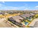 Gorgeous aerial view of neighborhood homes with private pools and green spaces in backyard oasis at 4247 S Zenith --, Mesa, AZ 85212